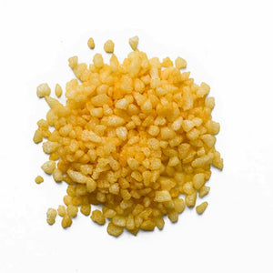 Yellow coloured fat coated sugar pearls